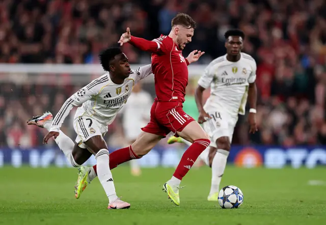 Vinicius Jr after he hauls down the marauding Conor Bradley.