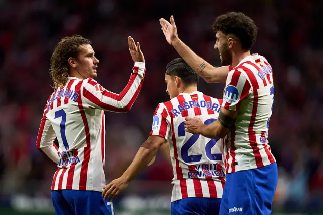 Griezmann and Ruggeri high five