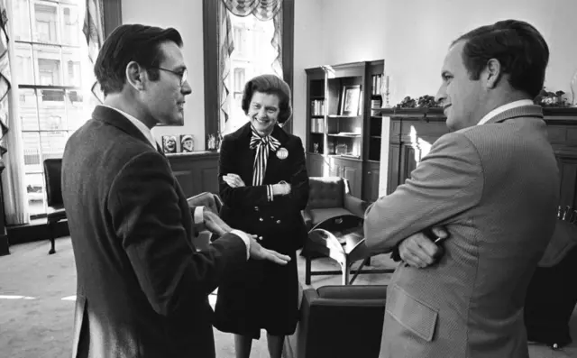 First Lady Betty Ford chats with White House Chief Of Staff Donald Rumsfeld (left) and Cheney in the West Wing of the White House in November 1974
