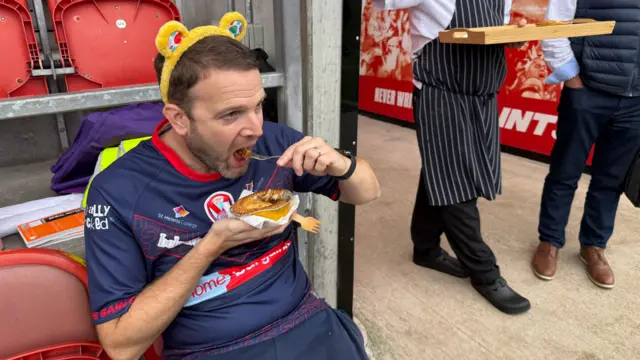 Paul Salt eats a pie