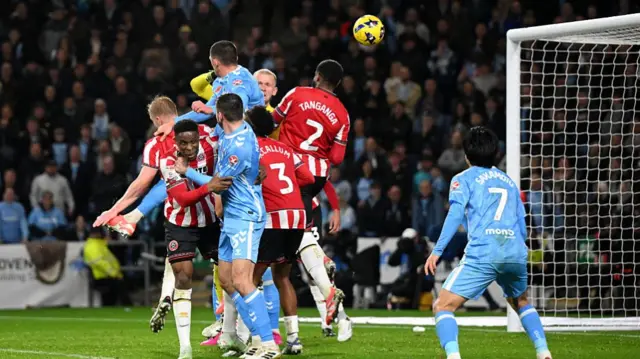 Bobby Thomas leaps to put Coventry into the lead against Sheffield United