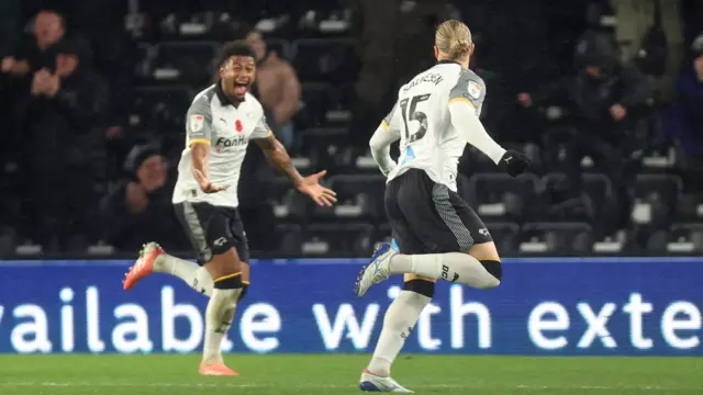 Derby goalscorer Lars-Jorgen Salvesen celebrates