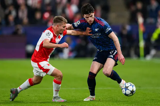 Michal Sadilek of Slavia Prague and Declan Rice of Arsenal compete for the ball