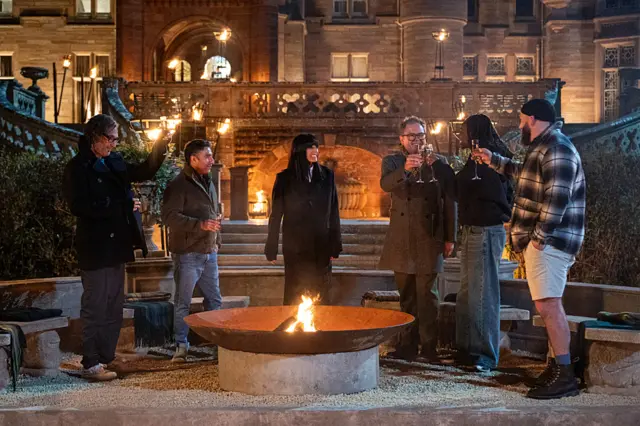 David, Nick, Claudia, Alan, Cat and Joe cheersing outside the Castle