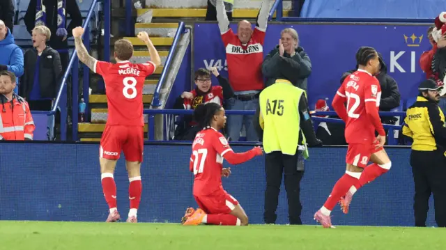 Middlesbrough players celebrate in front of their travelling fans