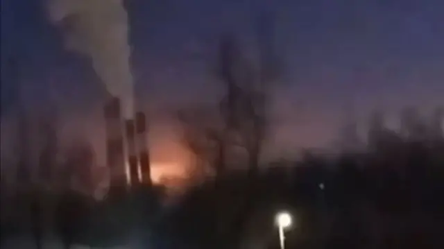A screengrab from a video showing the glow of what appears to be an explosion at the petrochemicals plant