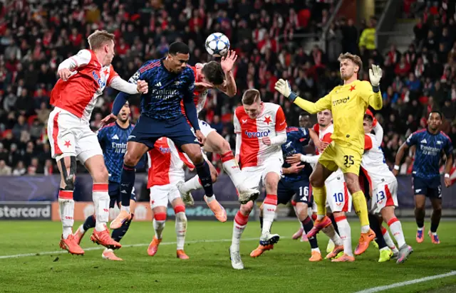 Lukas Provod of Slavia Praha handles the ball in the area which was then awarded a penalty for Arsenal
