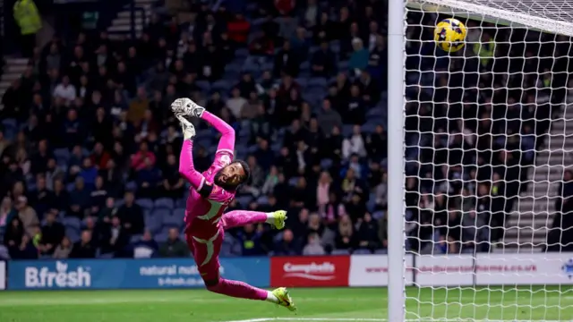 Swansea keeper Lawrence Vigouroux is beaten by Thierry Small