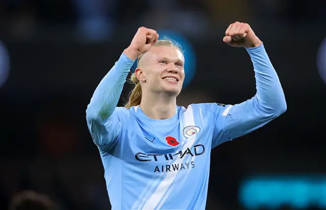 Erling Haaland celebrates after scoring for Man City