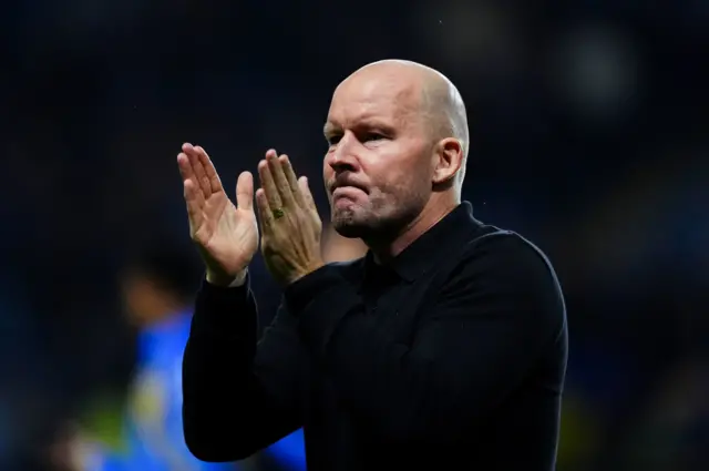 Sheffield Wednesday boss Henrik Pedersen applauds the fans