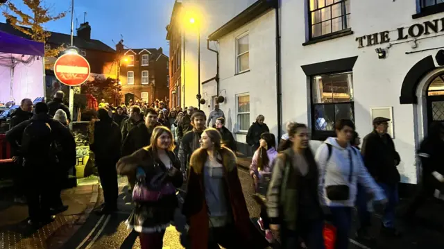 Crowds pouring in to Ottery St Mary.