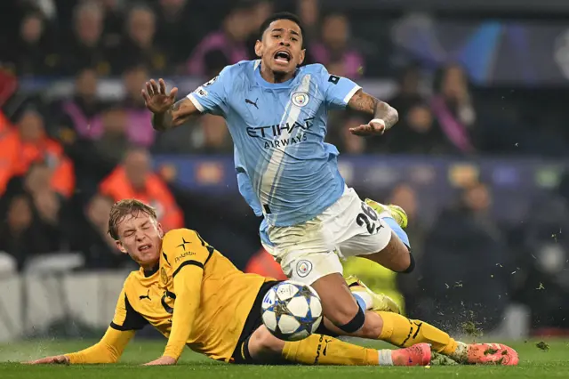 Daniel Svensson fouls Manchester City's Brazilian midfielder