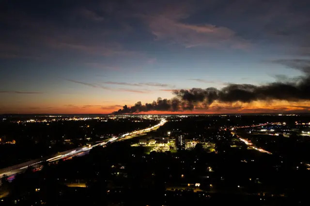 Smoke rises from the site of a UPS cargo plane crash near the UPS Worldport at Louisville Muhammad Ali International Airport in Louisville, Kentucky
