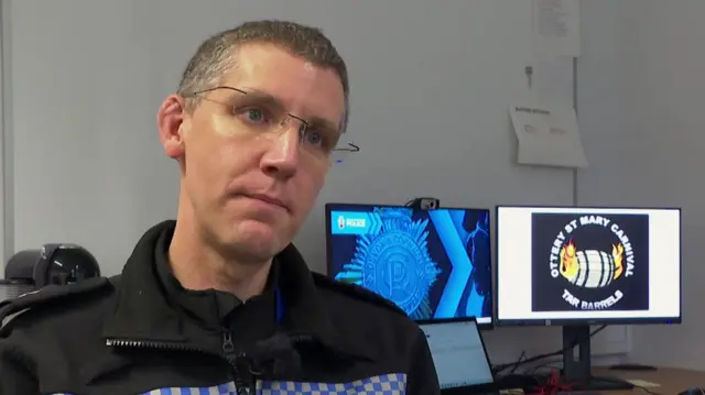 Joe Matthews sat in front of two computer screens.