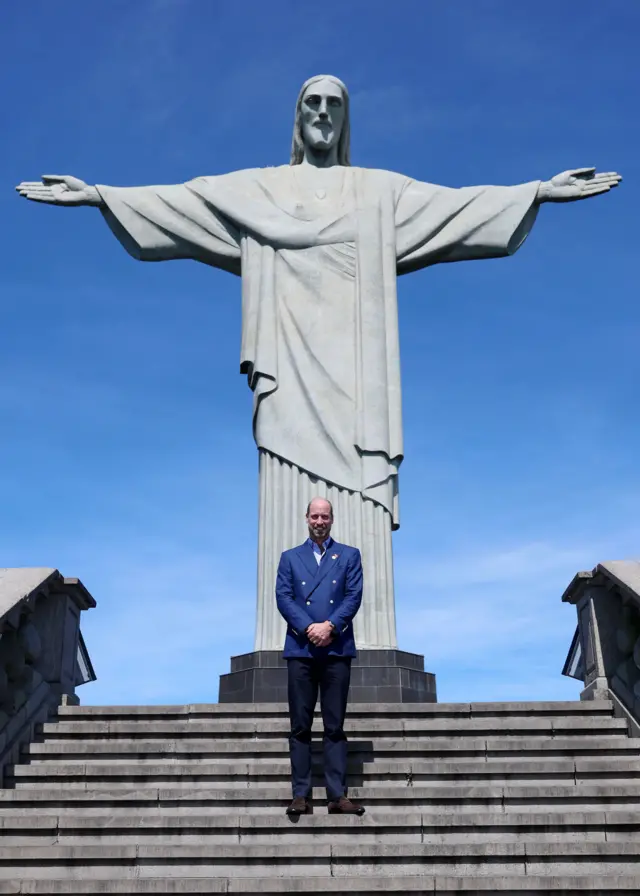 Prince Williams stands in front of the Christ the Redeemer statue in Rio de Janeiro.