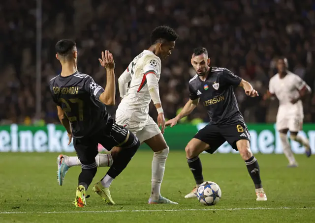 Estevao of Chelsea is challenged by Toral Bayramov