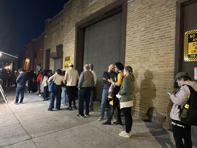people line up for an election watch party
