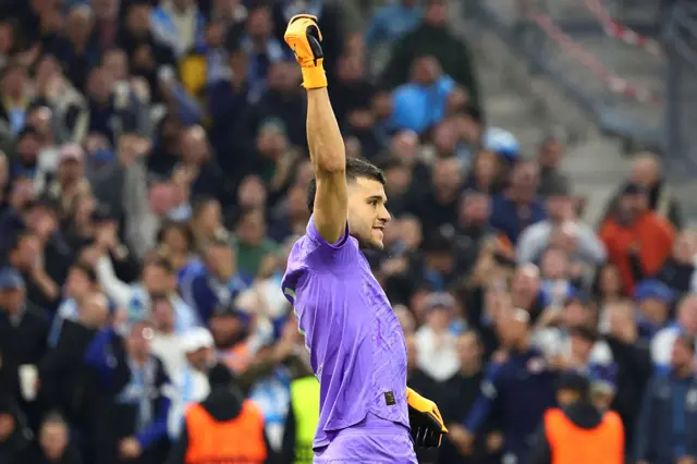 Rulli pumps his fist after saving a penalty