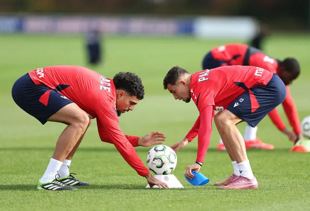 Chadi Riad training with Crystal Palace team-mate Jeremy Pino