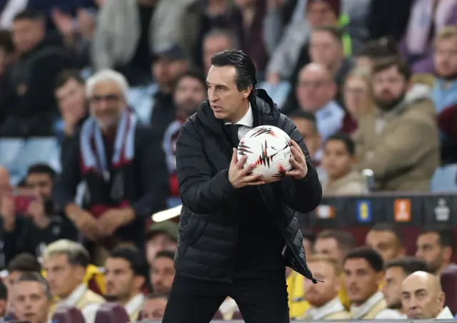Aston Villa manager Unai Emery catches the ball during the UEFA Europa League match between Aston Vila and Maccabi Tel Aviv, in Birmingham, Britain, 06 November 2025.