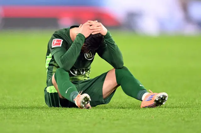 Mohammed Amoura of VfL Wolfsburg reacts after the Bundesliga match