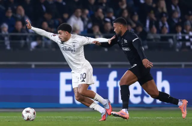 Nottingham Forest's Morgan Gibbs-White in action with SK Sturm Graz's Maurice Malone