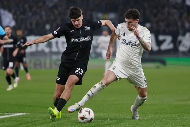 SK Sturm Graz's Arjan Malic in action with Nottingham Forest's Neco Williams