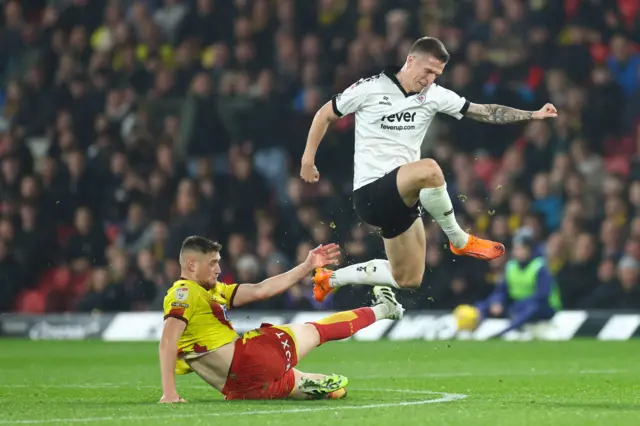 Emil Riis Jakobsen of Bristol City tackled by Mattie Pollock of Watford