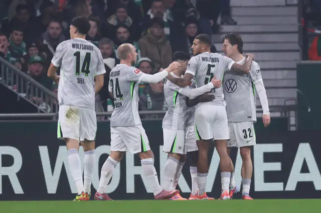 VfL Wolfsburg players celebrate