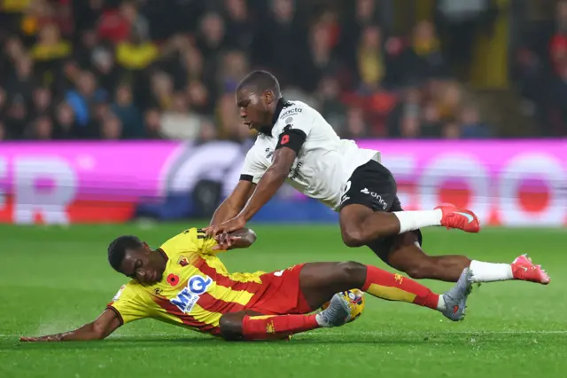 Sinclair Armstrong of Bristol City collides with Kevin Keben of Watford