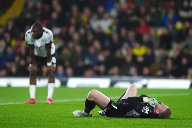 Watford goalkeeper Egil Selvik appears injured