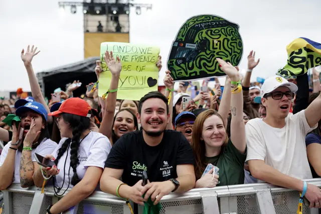 Fans hold up signs in Brazil
