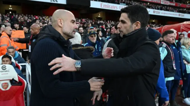 Pep Guardiola and Mikel Arteta