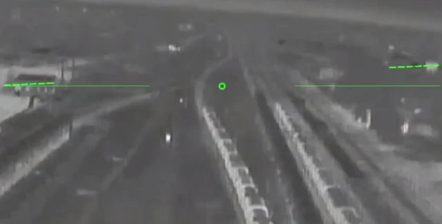 Gunsight footage from a Ukrainian drone as it attacks a railway yard in Russian-occupied Crimea