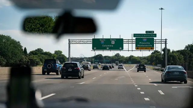 View ahead from inside a car as vehicles travel on Interstate 77 in Charlotte, North Carolina
