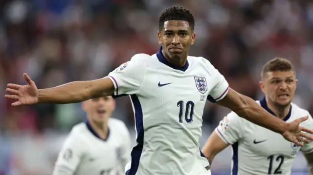 Jude Bellingham of England celebrates scoring his team's first goal