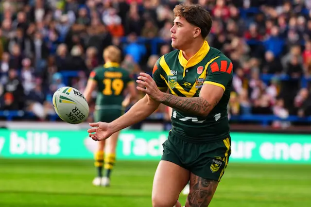 Reece Walsh of Australia warms up