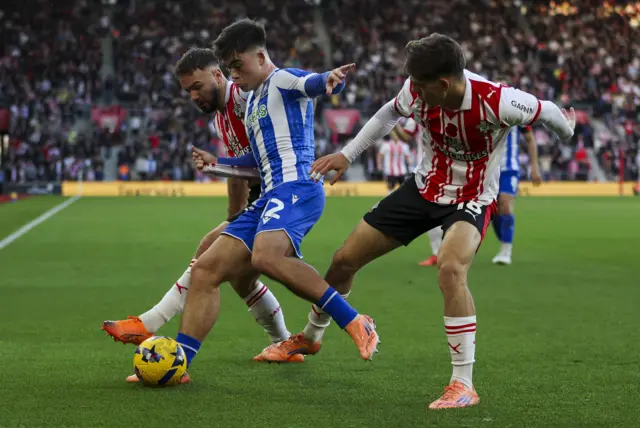 Sheffield Wednesday's Harry Amass, Southampton's Adam Armstrong and Tom Fellows (right) in action