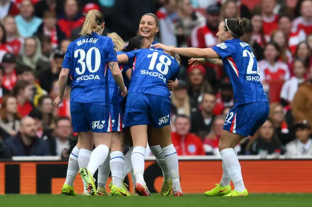 Alyssa Thompson of Chelsea (obscured) celebrates