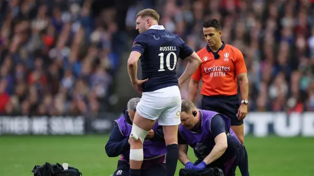 Finn Russell receives treatment