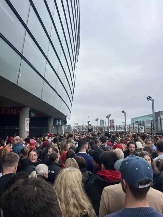 Fans outside Emirates stadium