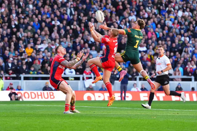 Mikey Lewis of England and Reece Walsh of Australia