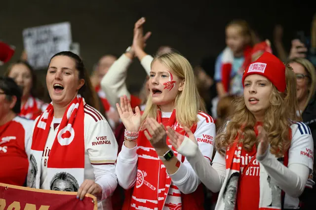 Arsenal fans arrive at the stadium