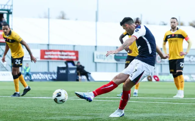 Brian Graham scores a penalty for Falkirk against Livingston