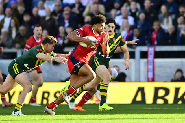 Kallum Watkins runs with the ball