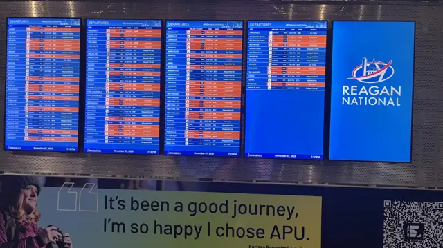 More cancelled flights stack up on the departures screen at Reagan National Airport in Washington