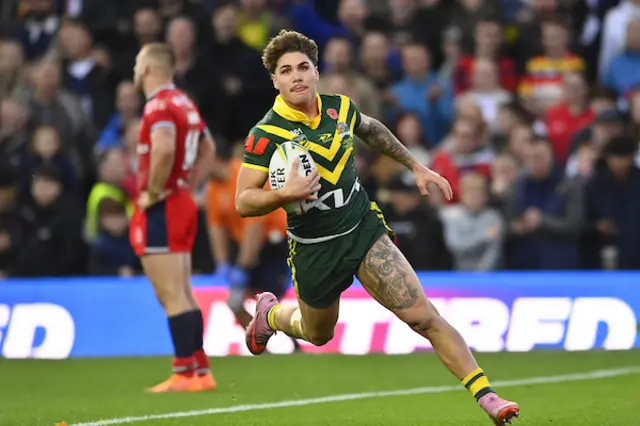 Reece Walsh runs in to score