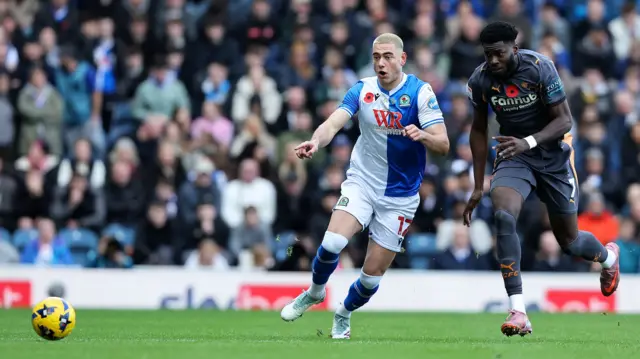Blackburn Rovers defender Lewis Miller (12) and Derby County forward Patrick Agyemang (7)