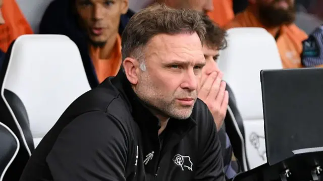 John Eustace on the Derby bench