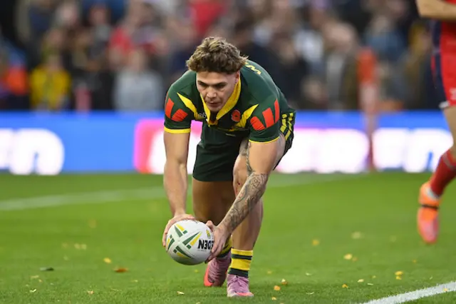 Reece Walsh scores a try